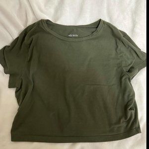 green cropped top